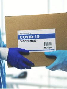 medical-worker-accepting-delivery-of-covid19-vaccines